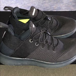 Black Nike Free and Flexible running shoes